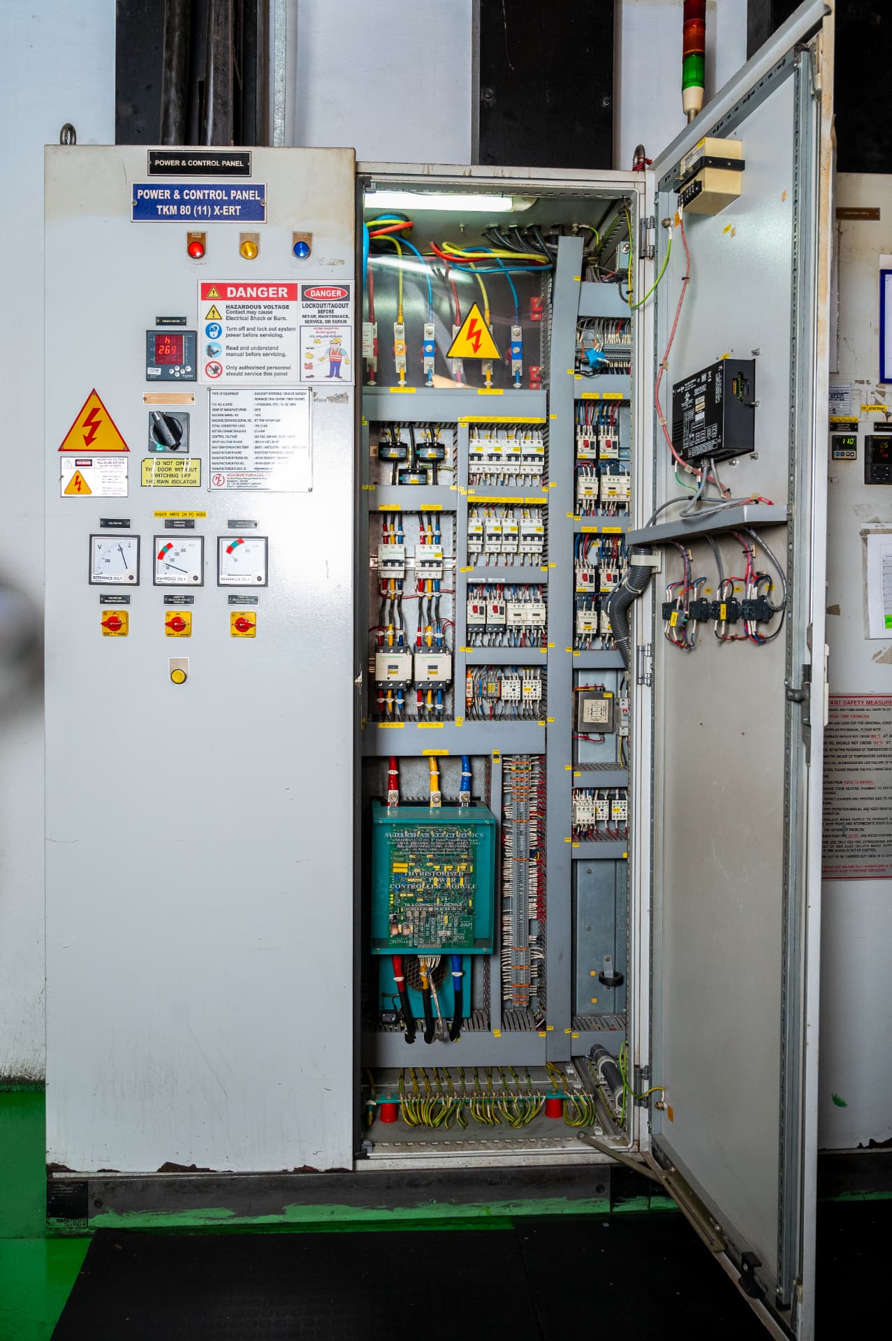 Open power and control panel of a heat treatment furnace with a Sudarshan Electronics thyristorised control module mounted inside